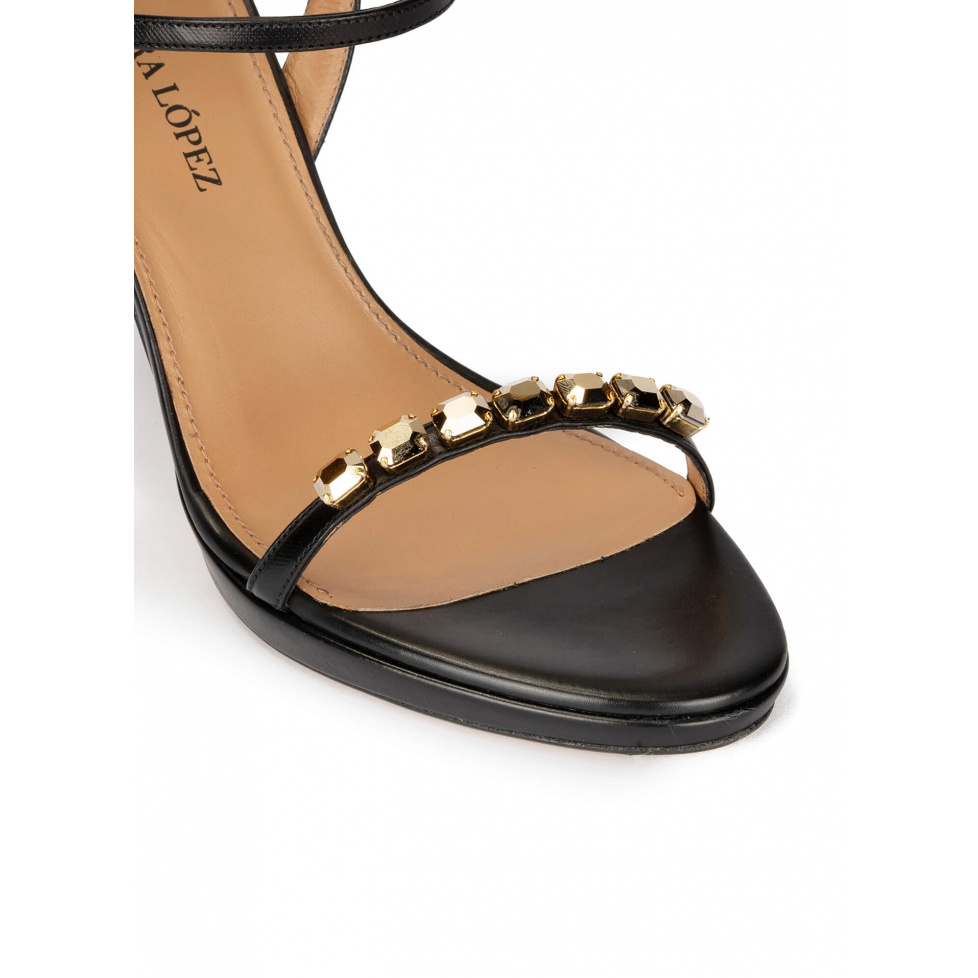 Crystal embellished platform heeled sandals in black