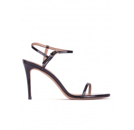 Strappy stiletto heel sandals in black patent leather Pura López