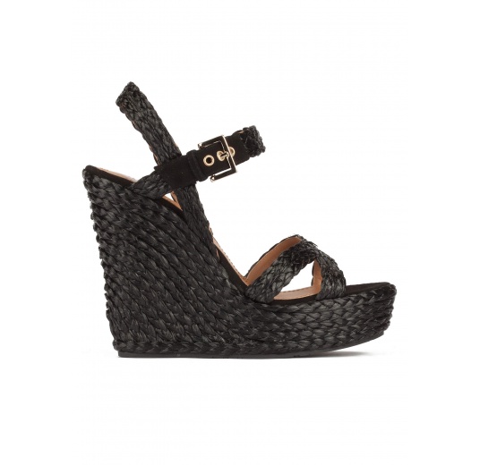 High wedge sandals in black raffia with buckle fastening Pura López