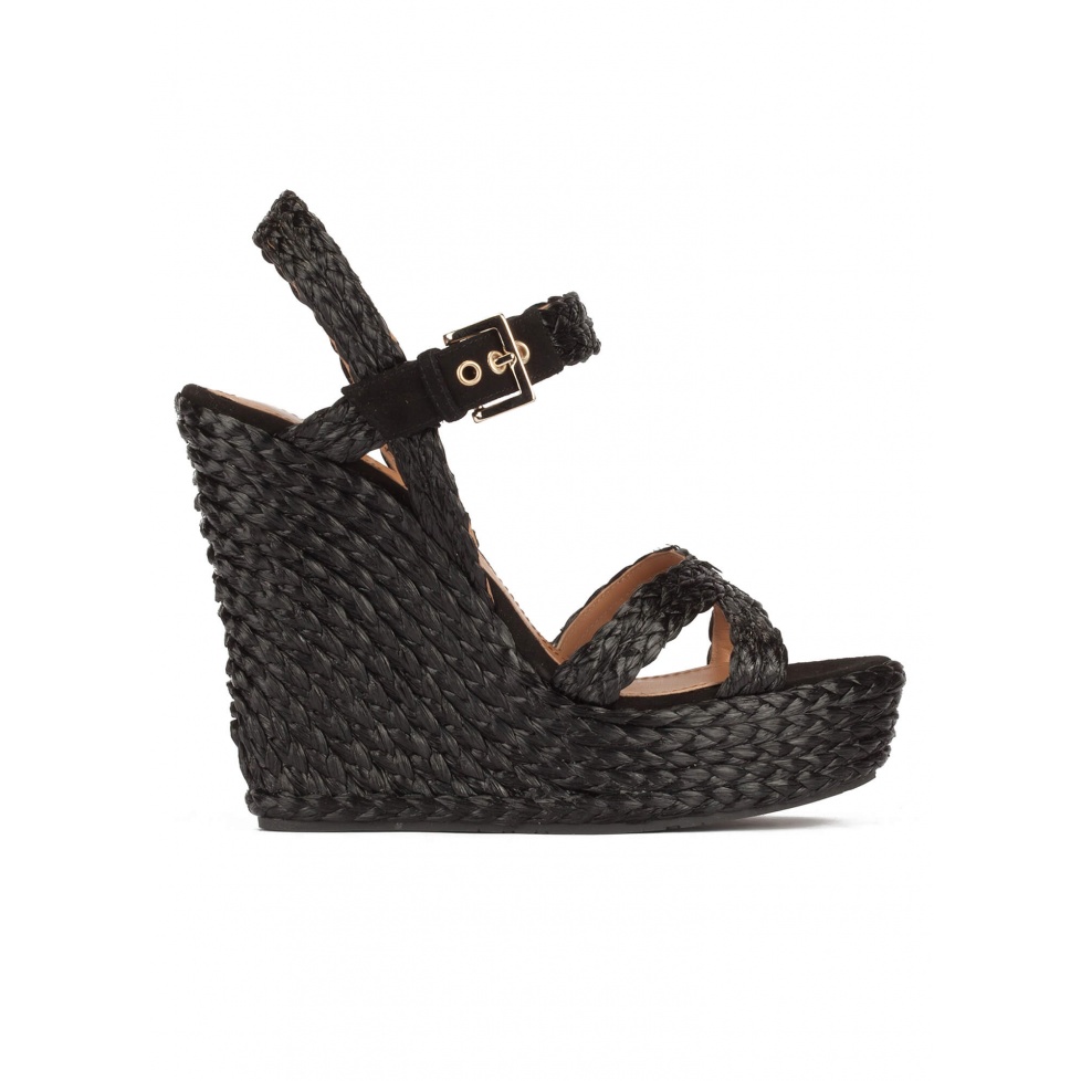 High wedge sandals in black raffia with buckle fastening