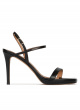 Platform heeled sandals in black leather