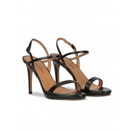 Platform heeled sandals in black leather Pura López