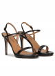 Platform heeled sandals in black leather