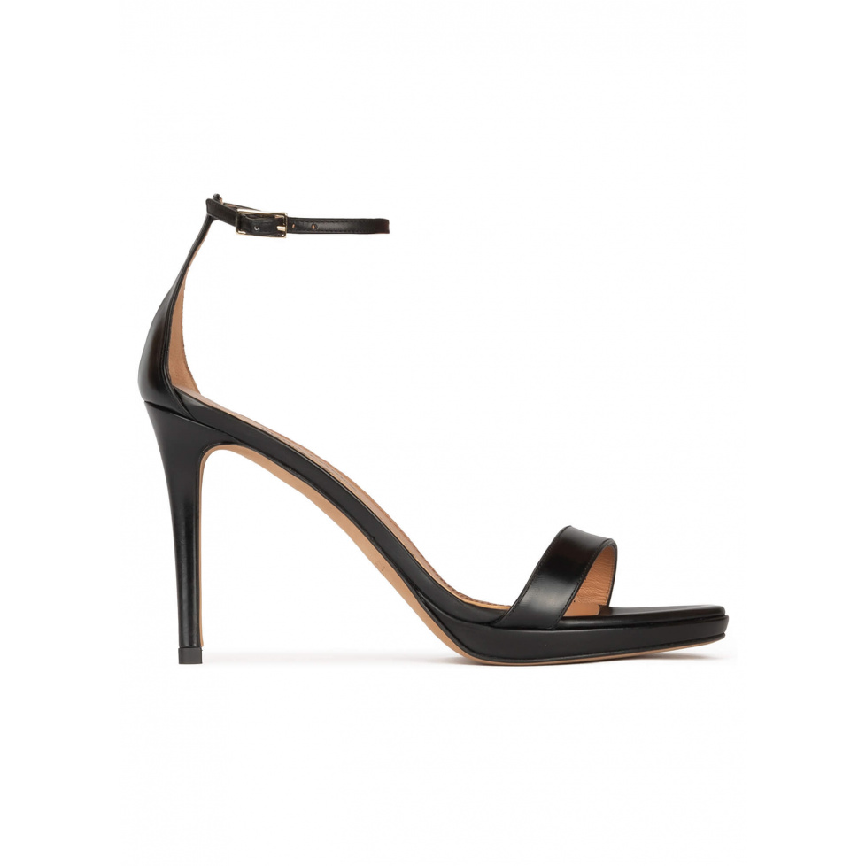 Ankle strap platform heeled sandals in black leather