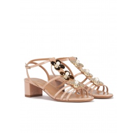 Mid block heel sandal in nude patent with floral trims Pura López
