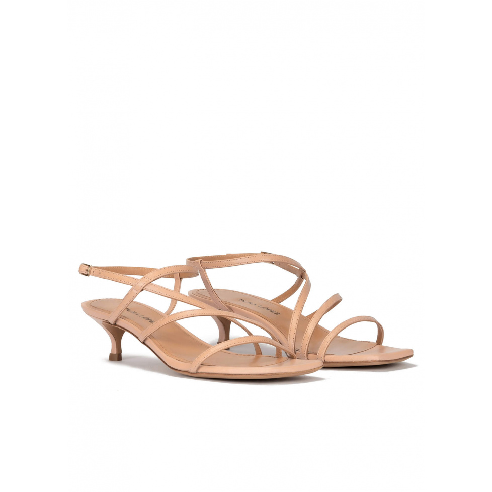 Mid heel sandal in nude leather with strappy design