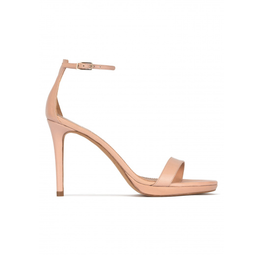 Platform heeled sandals in nude leather Pura López