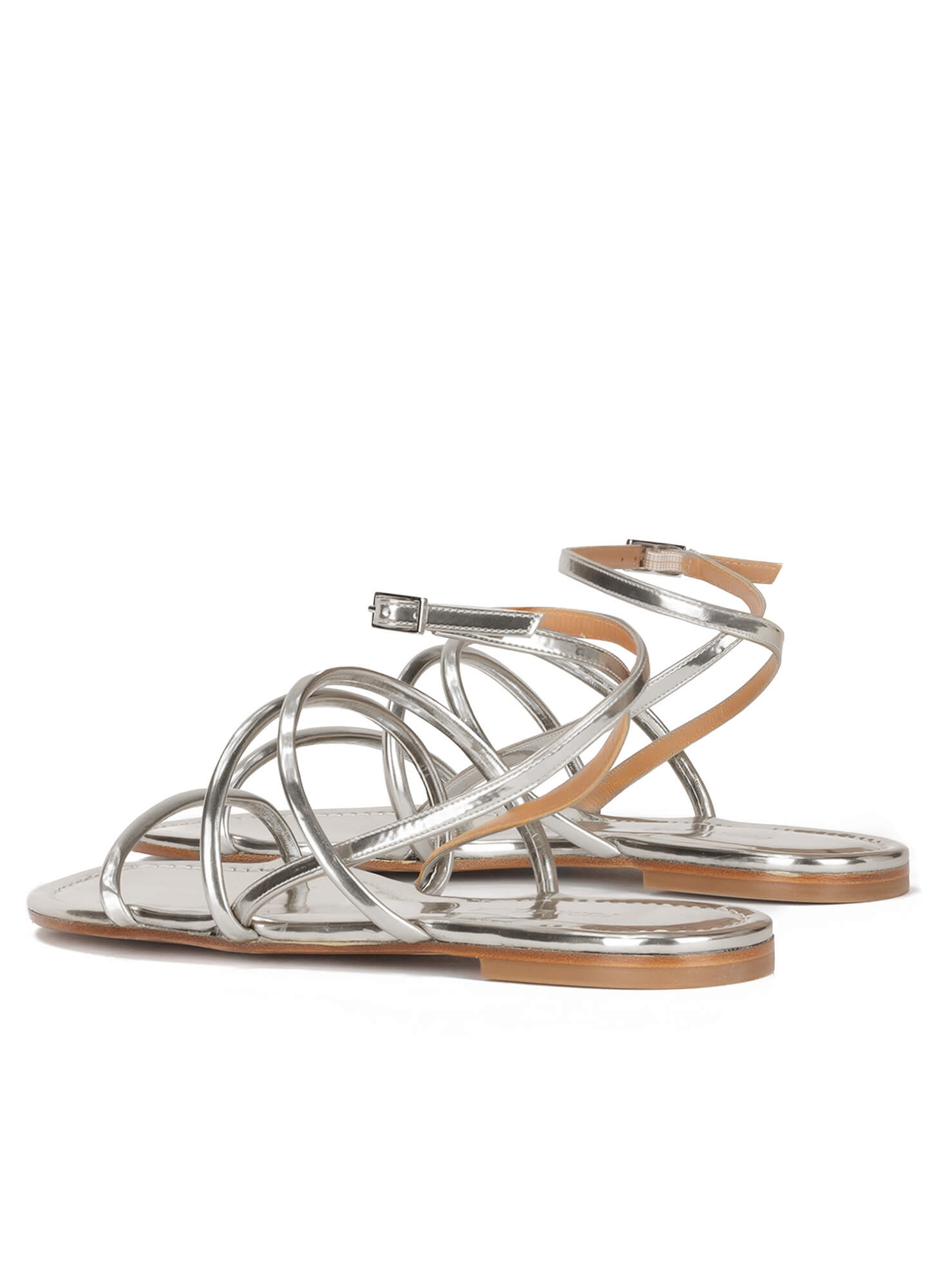 Strappy flat sandals in silver leather . PURA LOPEZ