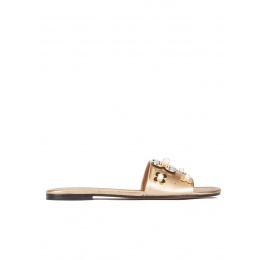 Flower-embellished flat sandals in golden metallic leather Pura López