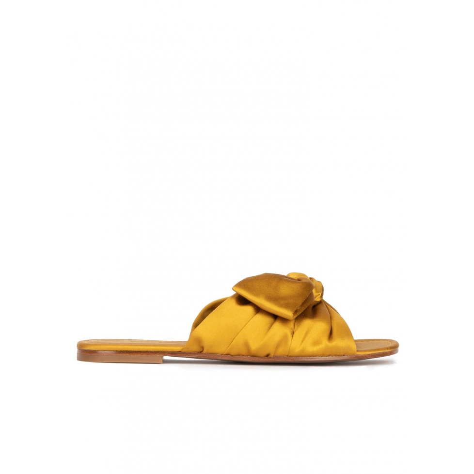 Bow detailed flat sandals in mustard satin