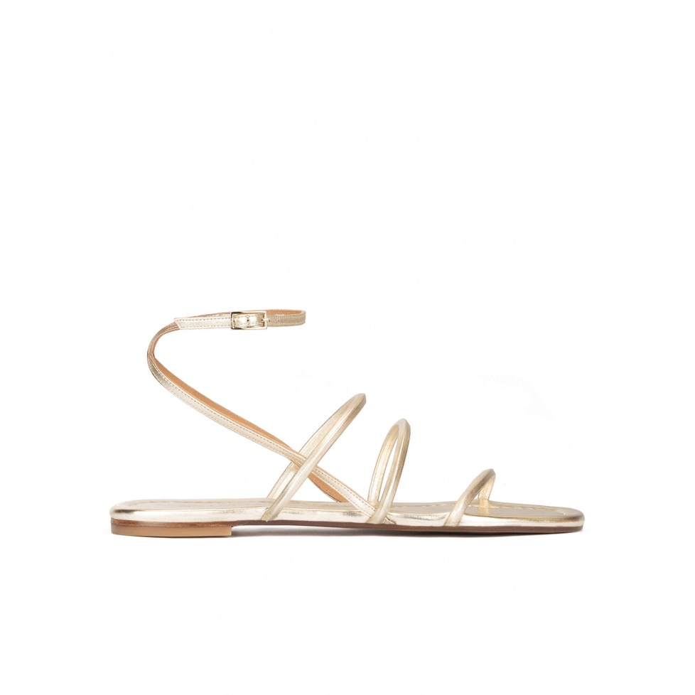 Ankle strap flat sandals in platin metallic leather