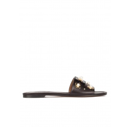 Flower-embellished slides in black leather Pura López