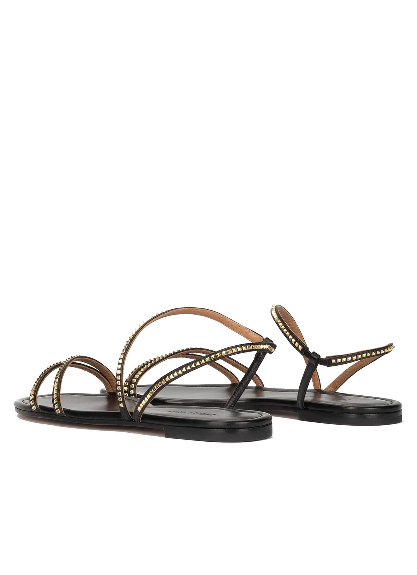 Strappy flat sandals in black leather . PURA LOPEZ