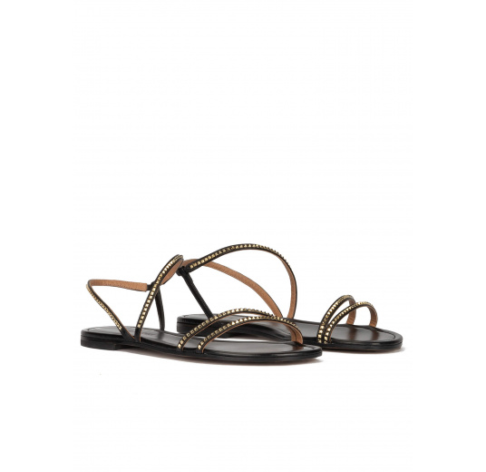 Strappy flat sandals in black leather with golden studs Pura López