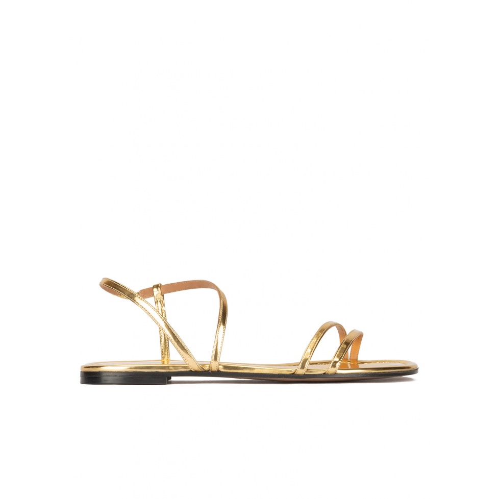 Multi-strap flat sandals in gold mirrored leather