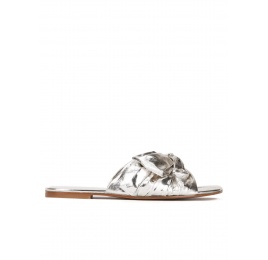 Flat sandals with bow detail made from silver fabric Pura López