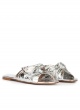 Flat sandals with bow detail made from silver fabric