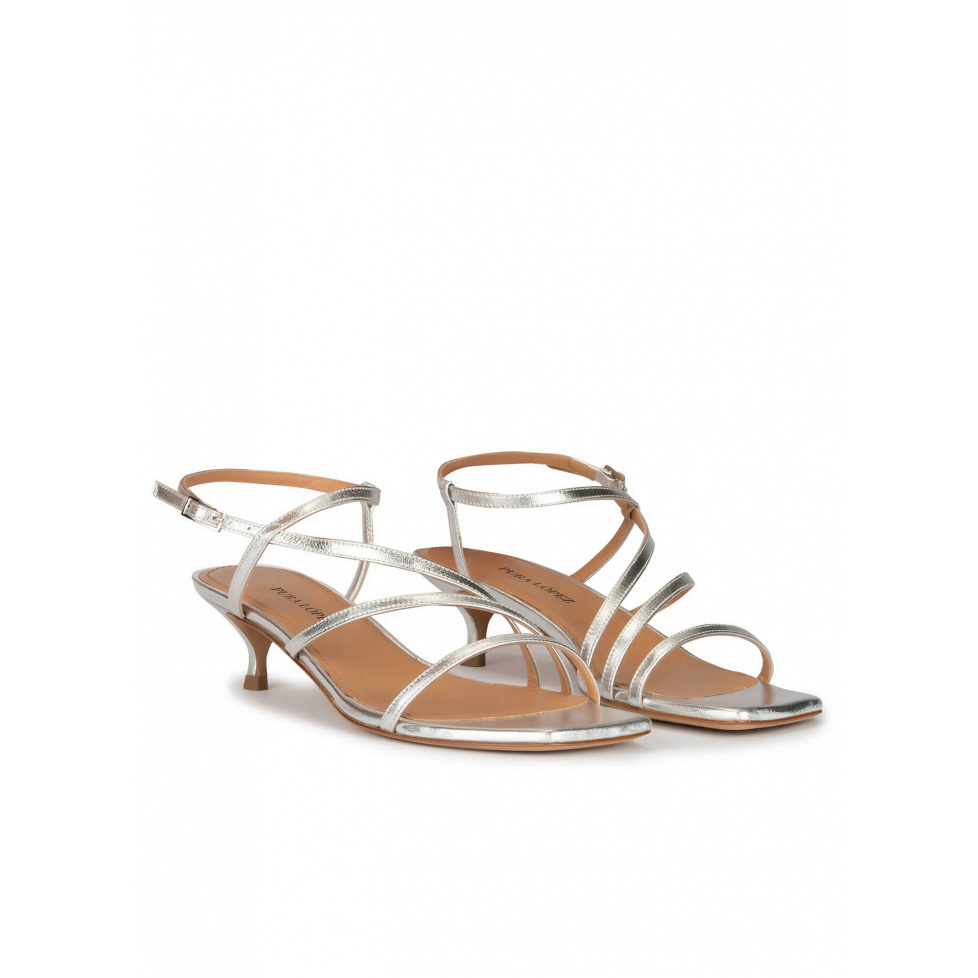 Strappy mid heel sandals in silver metallic leather . PURA LOPEZ