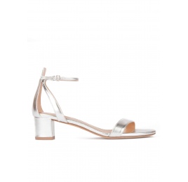 Silver ankle strap mid block heel sandals in metallic leather Pura López