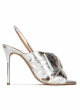 Bow embellished silver high heel sandals in metallic leather