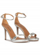 Silver platform heeled sandals in metallic leather