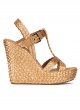 Wedge sandals in bronze raffia