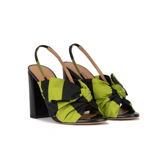 Bow detailed high block heel sandals in green and black fabric Pura López