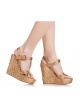 Wedge sandals in bronze raffia