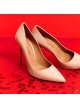 High heel pointy toe pumps in beige leather