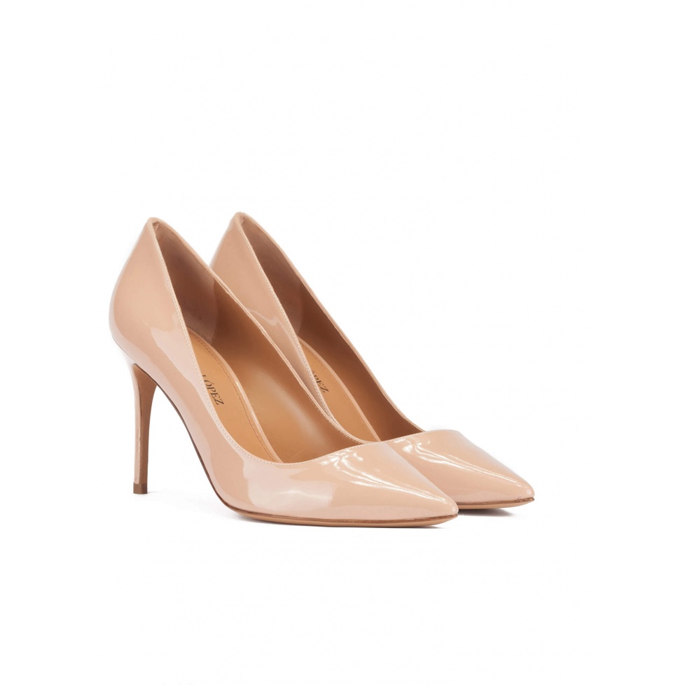 Pointy toe high heel pumps in nude patent leather