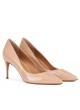 Pointed toe mid-heeled pumps in nude patent leather