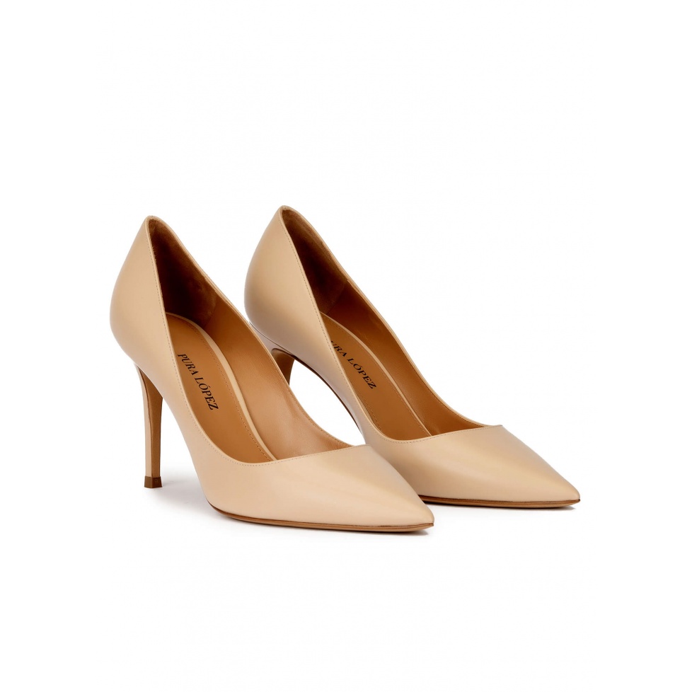 Pointy toe high heel pumps in beige leather