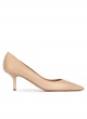 Mid-heeled pointed toe pumps in beige leather