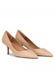 Mid-heeled pointed toe pumps in beige leather