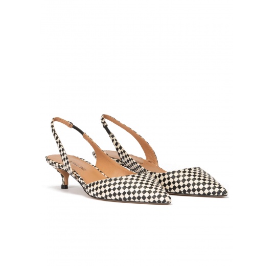 Black slingback pumps in black and white checked raffia Pura López