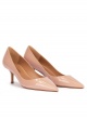 Mid heel pointy toe pumps in nude patent leather