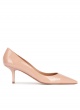 Mid heel pointy toe pumps in nude patent leather