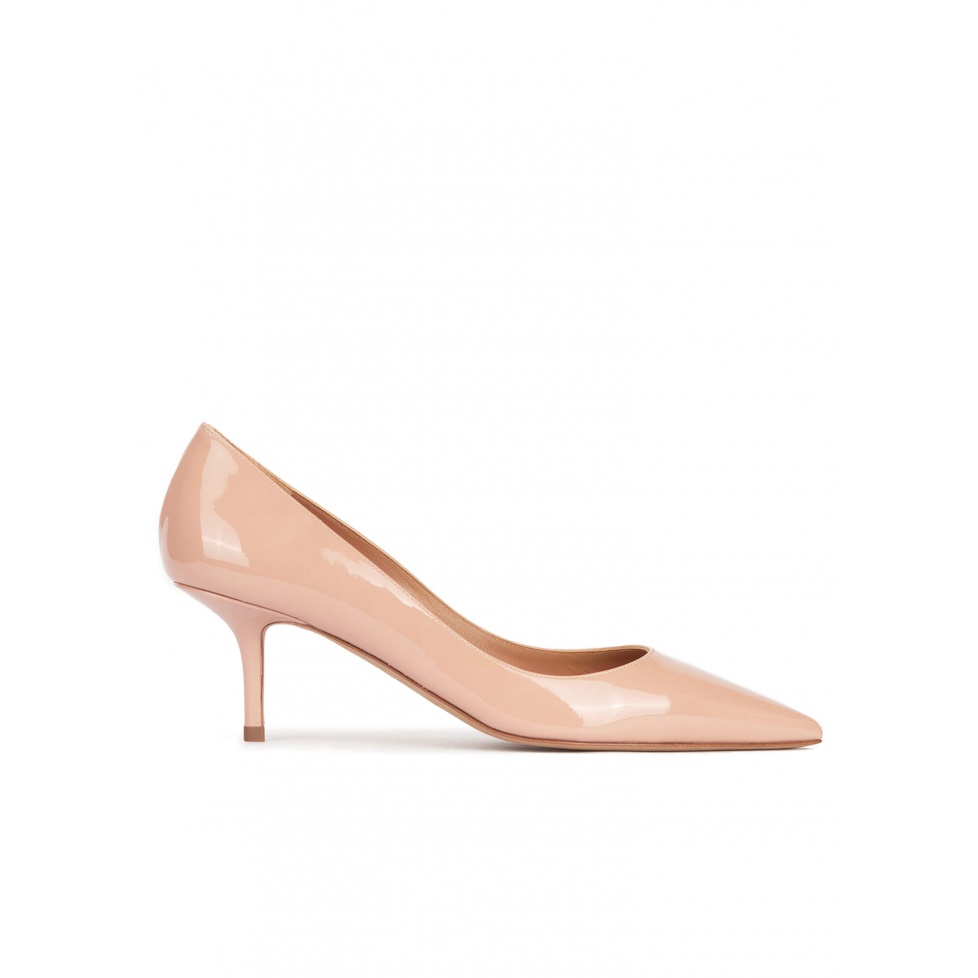 Mid heel pointy toe pumps in nude patent leather