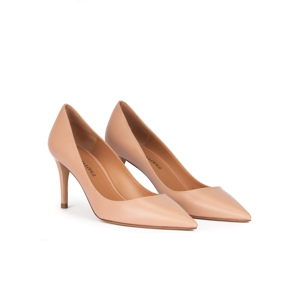 Mid heel sharp point-toe pumps in nude leather