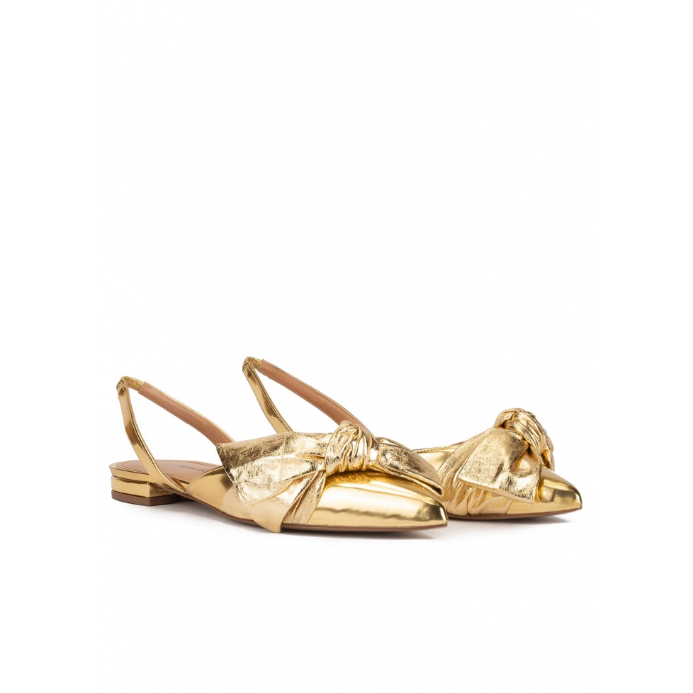 Slingback pointy toe flats in gold mirrored leather