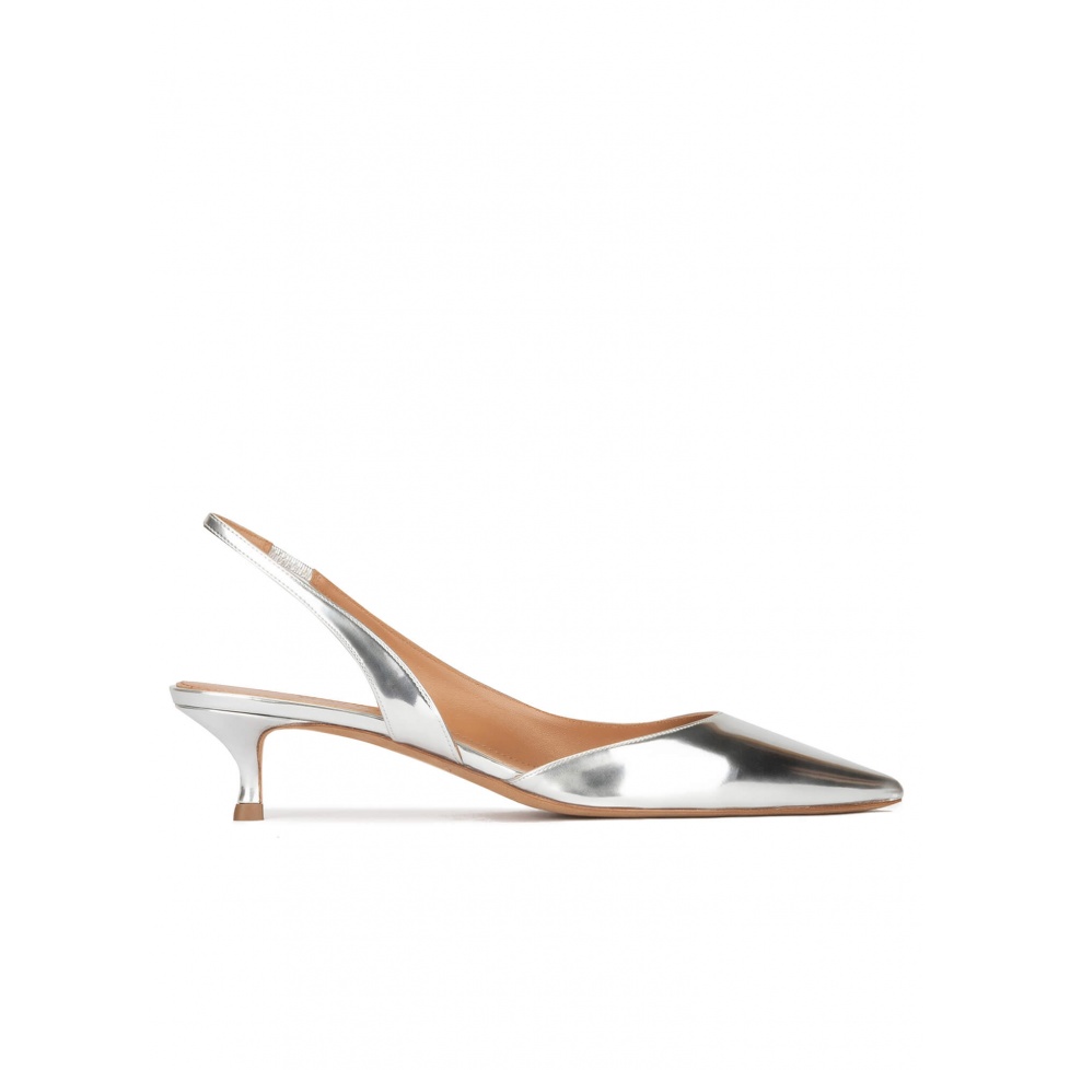 Slingback kitten heel pumps in silver mirrored leather . PURA LOPEZ