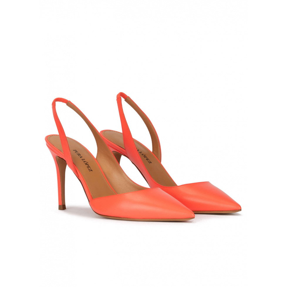 Slingback high heel point-toe pumps in coral leather